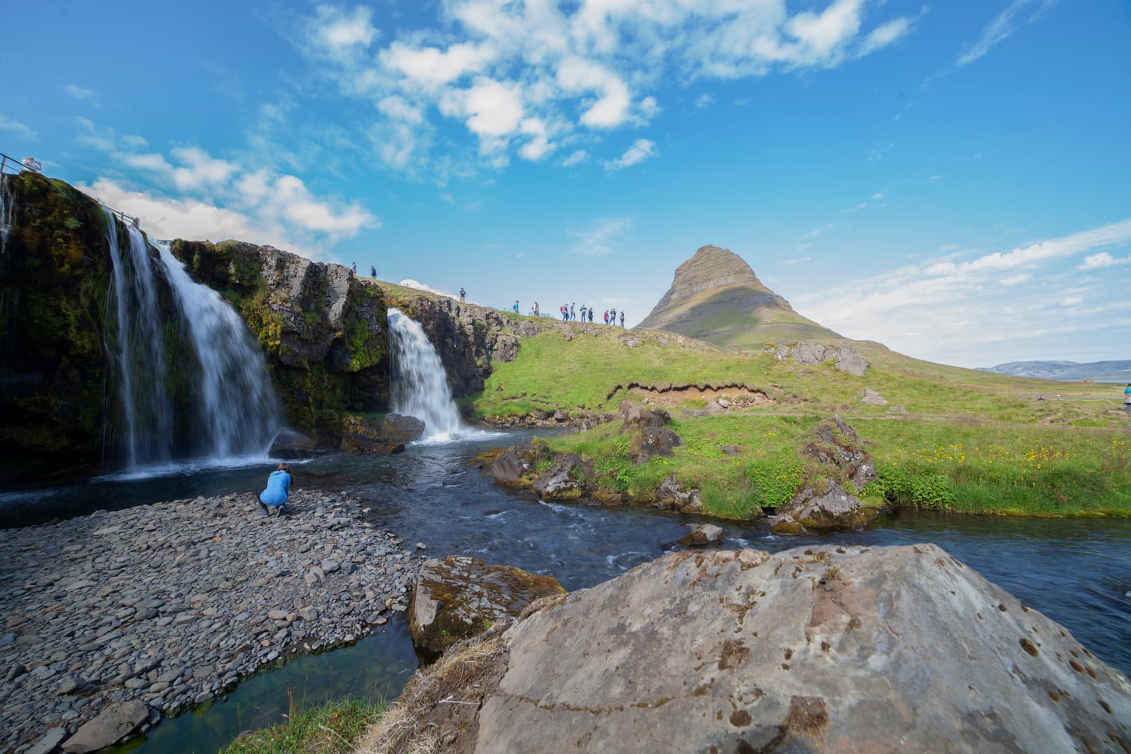 Kirkjufellsfoss waterfall with Kirkjufell mountain behind it